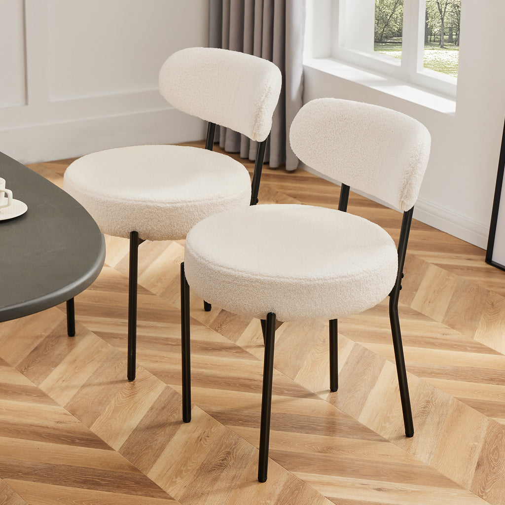 Modern cushioned dining chair with black steel frame for dining room