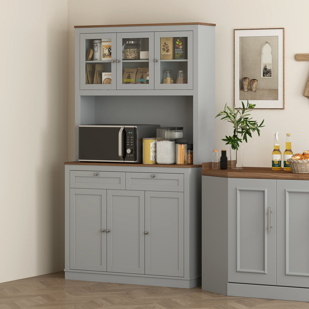 Gray kitchen cabinet with wooden top and shelves, featuring a microwave and other kitchen items.