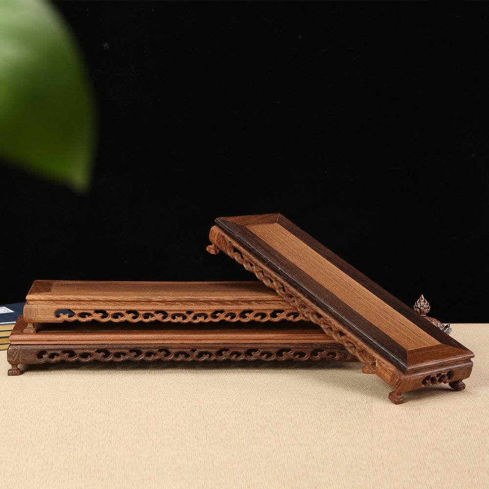 wooden plant holder for purple clay pot display
